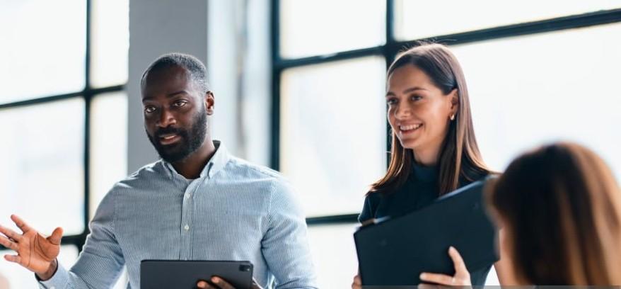 Business professionals reviewing strategy and planning growth