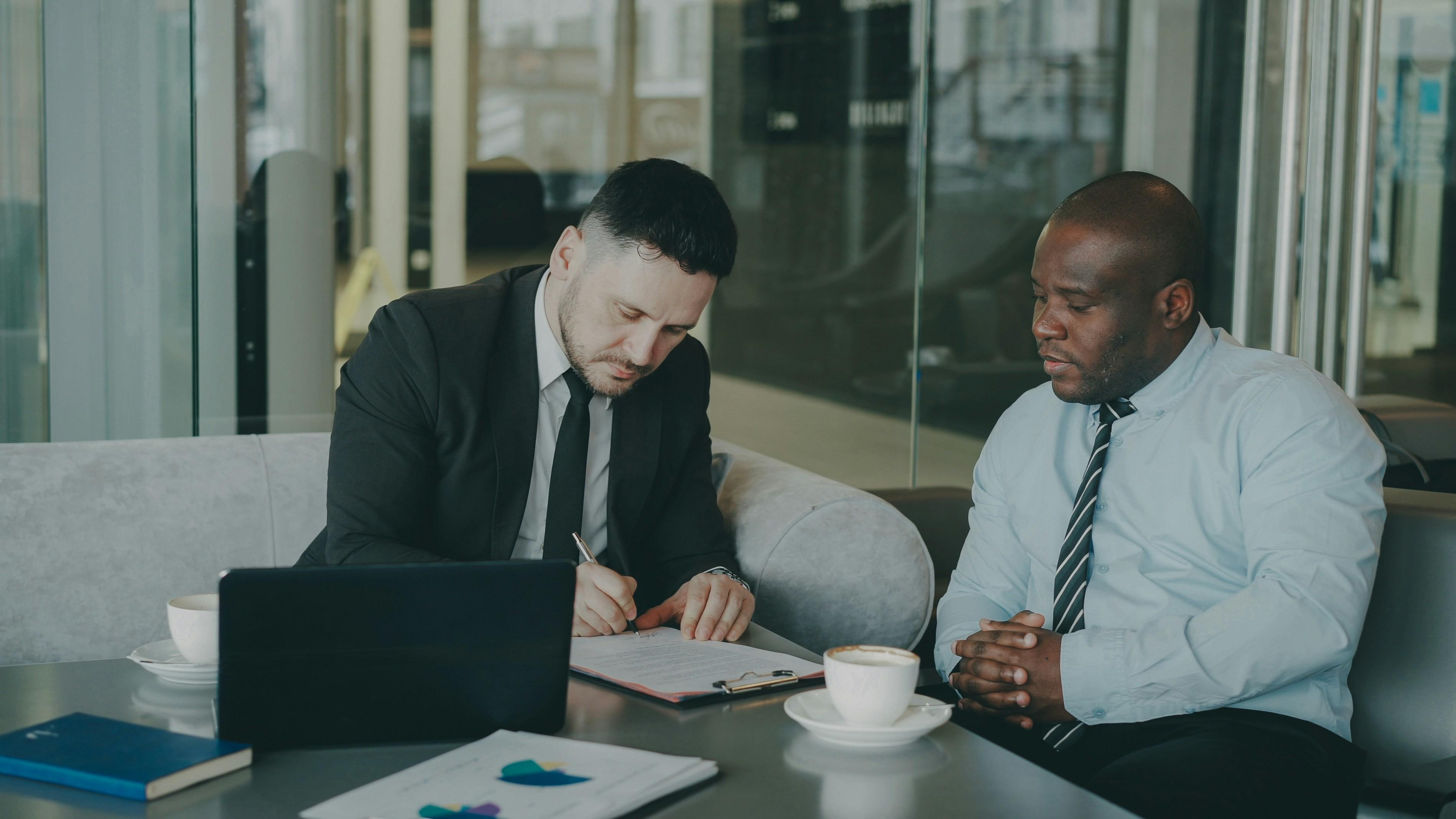 Business professionals collaborating in a partnership meeting